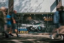Modern Ribble bike shop storefront with outdoor signage and bike display in Leeds, UK.