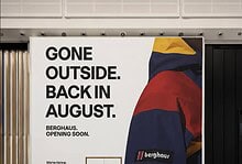 Outdoor Insight Berghaus store opening soon banner at shopping centre.